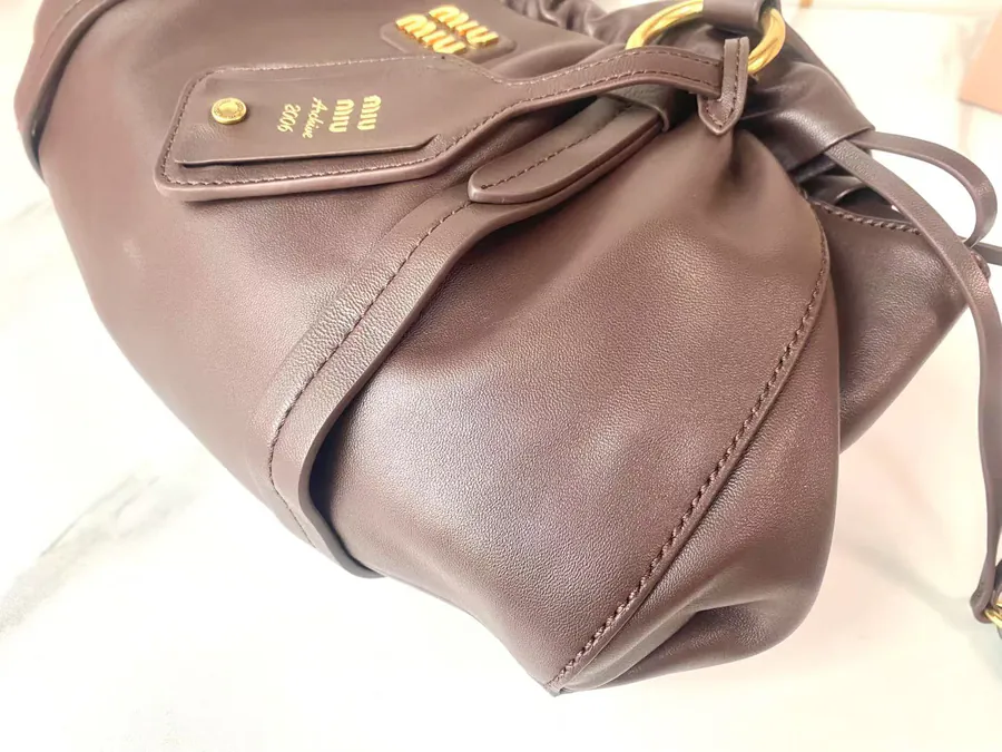 MIU Vintage Bucket Bag with Grained Calfskin and Metal Hardware