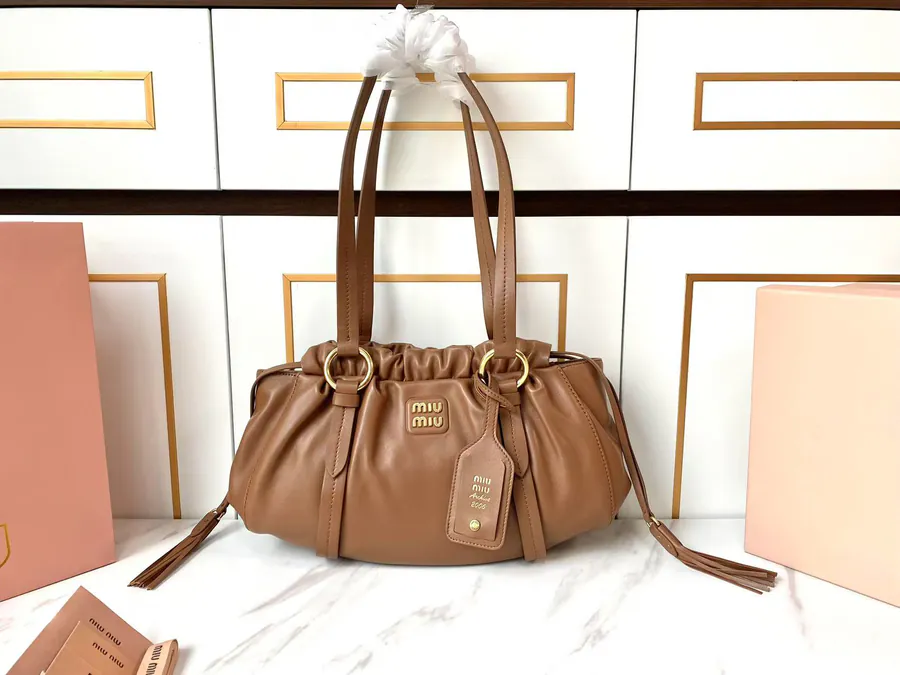 MIU Vintage Bucket Bag with Grained Calfskin and Metal Hardware