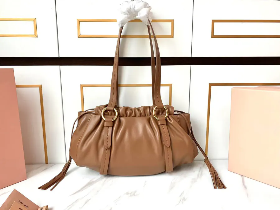 MIU Vintage Bucket Bag with Grained Calfskin and Metal Hardware