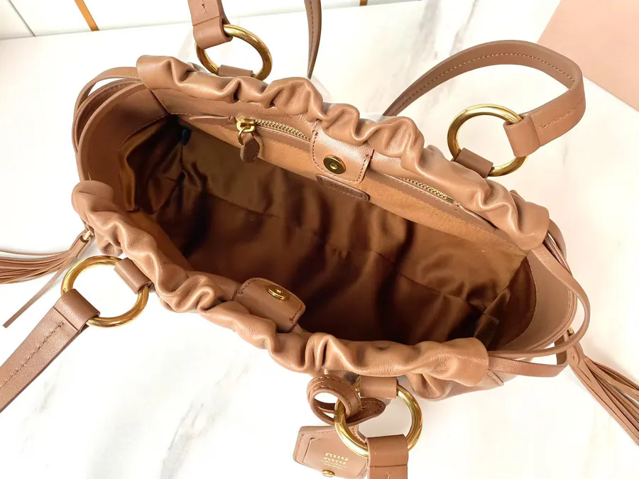 MIU Vintage Bucket Bag with Grained Calfskin and Metal Hardware