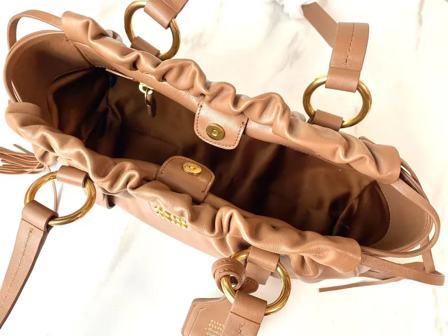 MIU Vintage Bucket Bag with Grained Calfskin and Metal Hardware