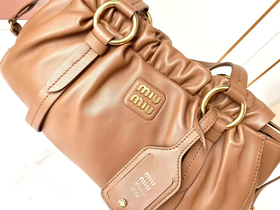 MIU Vintage Bucket Bag with Grained Calfskin and Metal Hardware