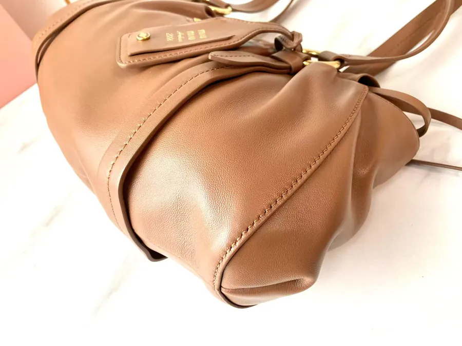 MIU Vintage Bucket Bag with Grained Calfskin and Metal Hardware