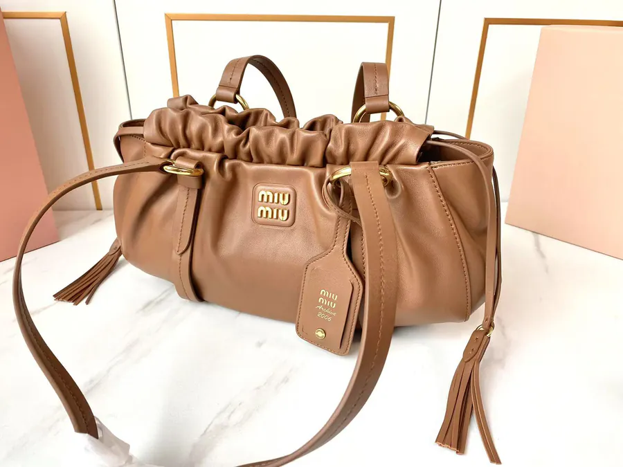 MIU Vintage Bucket Bag with Grained Calfskin and Metal Hardware