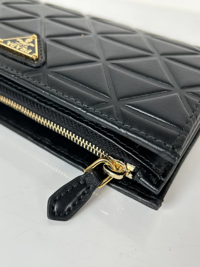 Ada Embossed Leather Wallet with Snap Closure