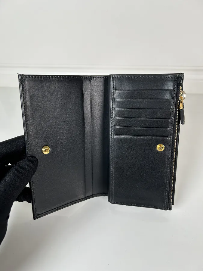 Ada Embossed Leather Wallet with Snap Closure