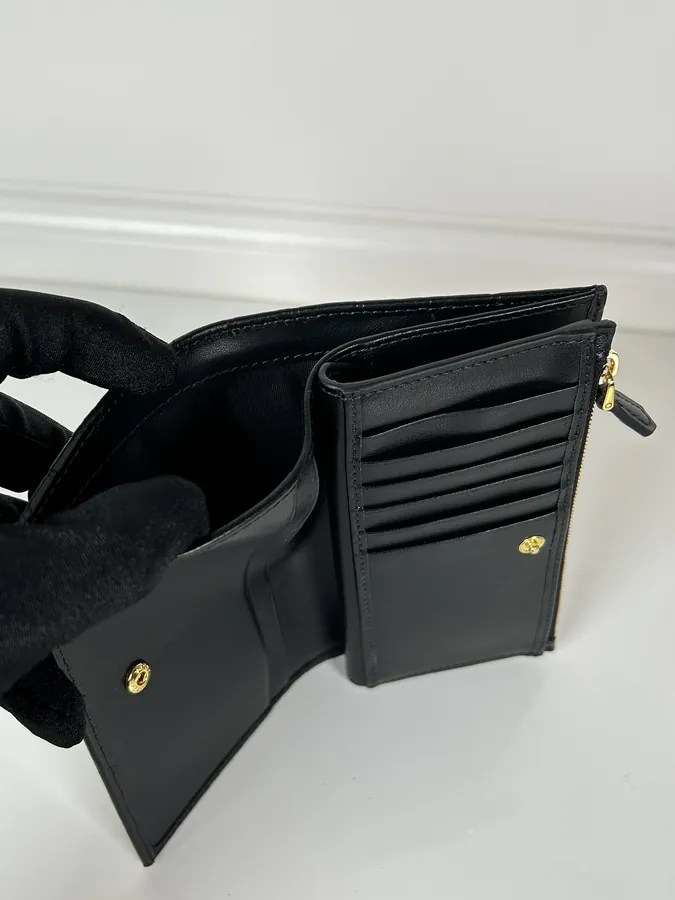 Ada Embossed Leather Wallet with Snap Closure