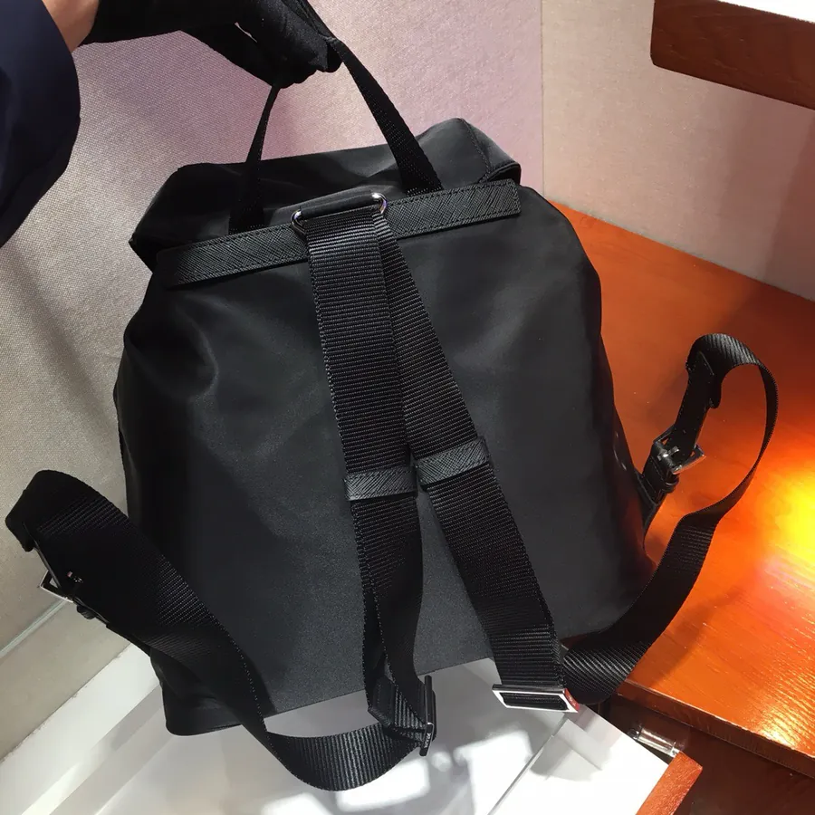 Ada Latest Nylon Backpack with Classic Triangular Enamel Logo