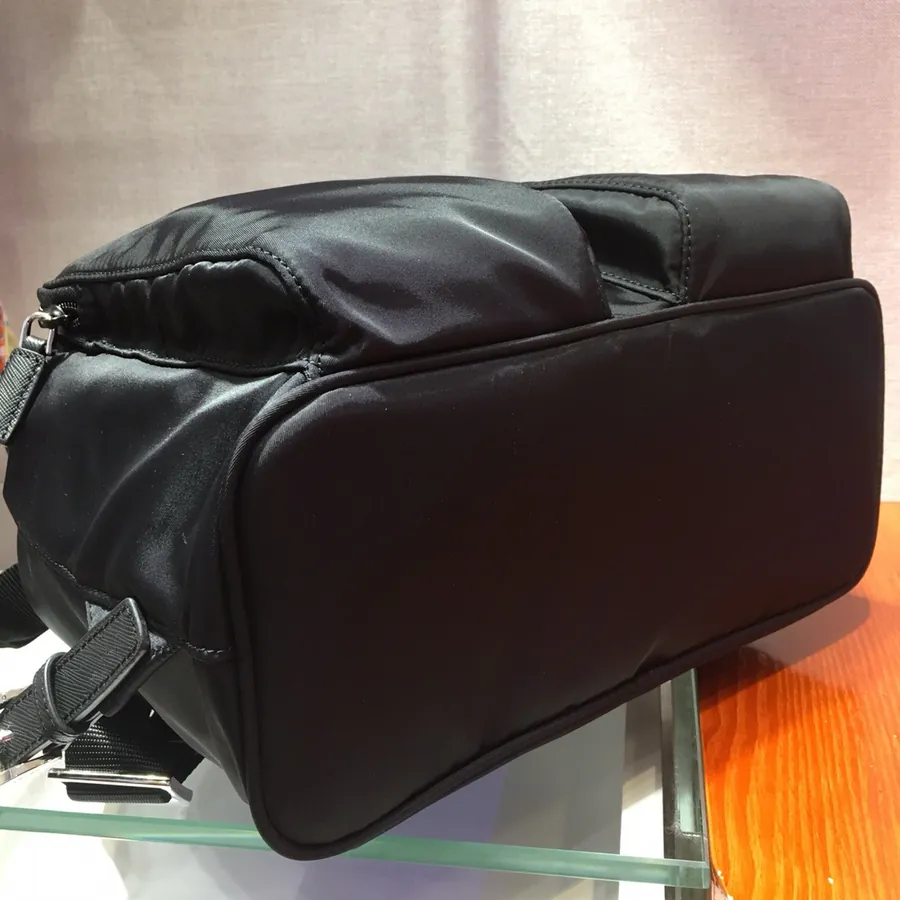 Ada Latest Nylon Backpack with Classic Triangular Enamel Logo