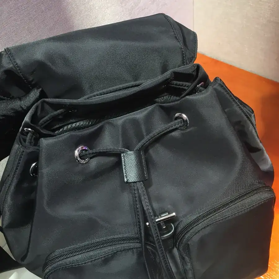 Ada Latest Nylon Backpack with Classic Triangular Enamel Logo