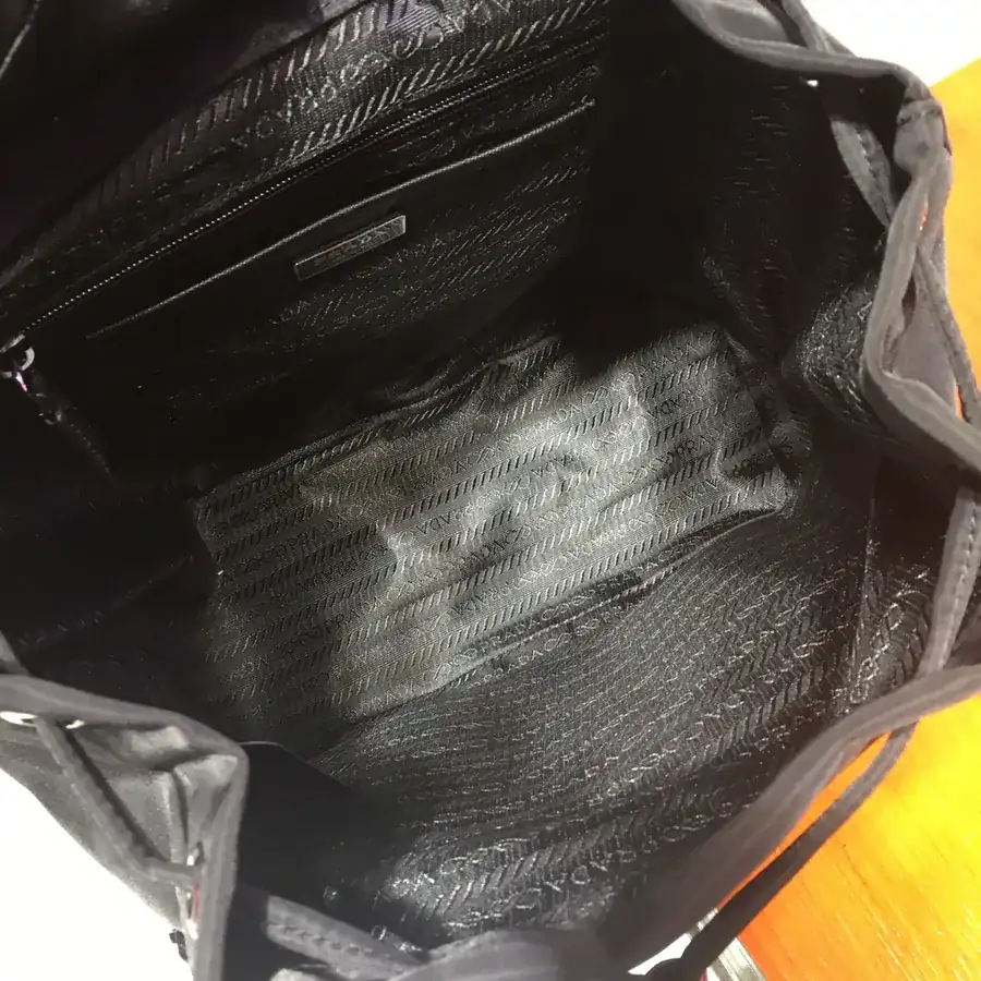 Ada Latest Nylon Backpack with Classic Triangular Enamel Logo