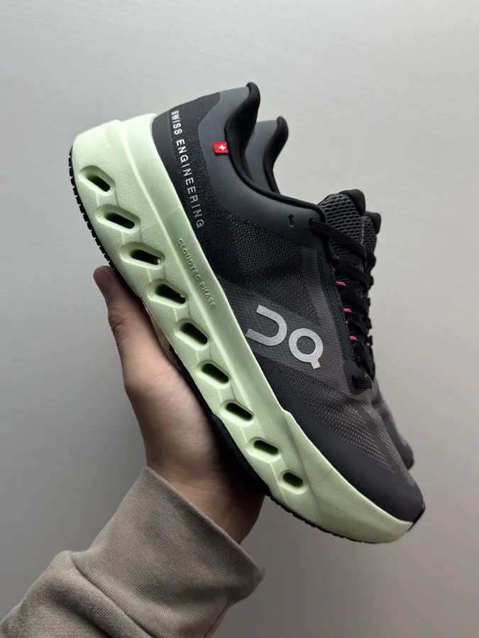 On Cloudsurfer Next in Black and Green