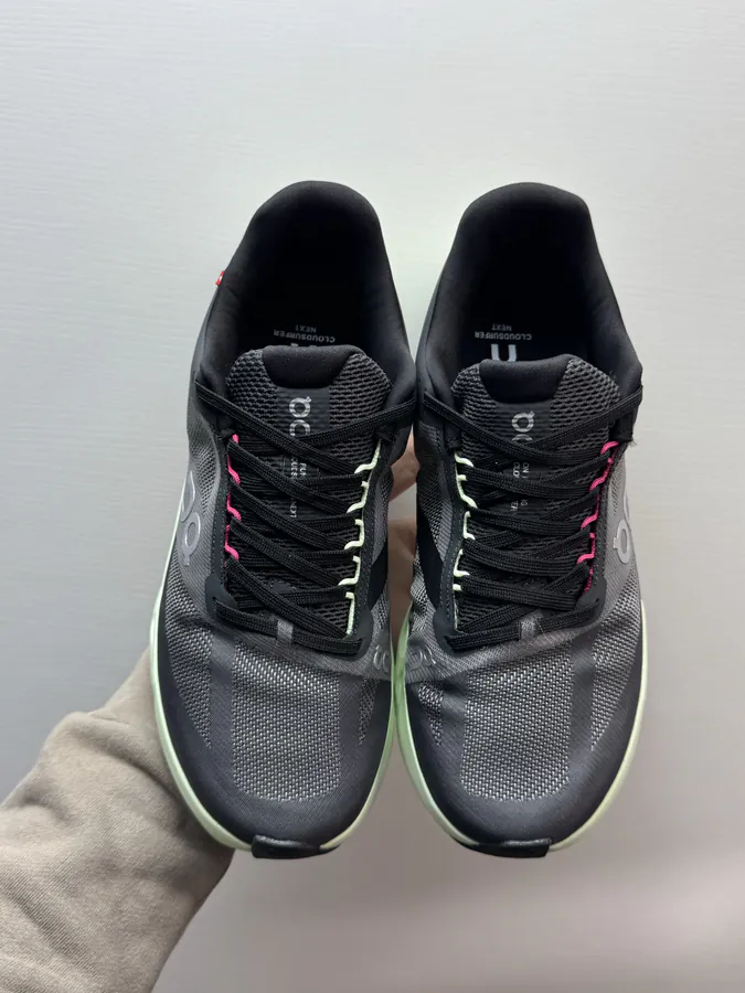 On Cloudsurfer Next in Black and Green