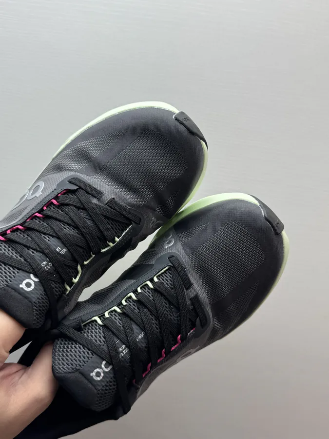 On Cloudsurfer Next in Black and Green