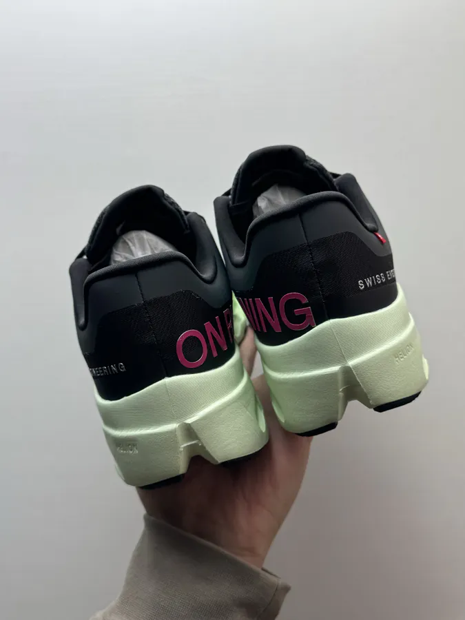 On Cloudsurfer Next in Black and Green