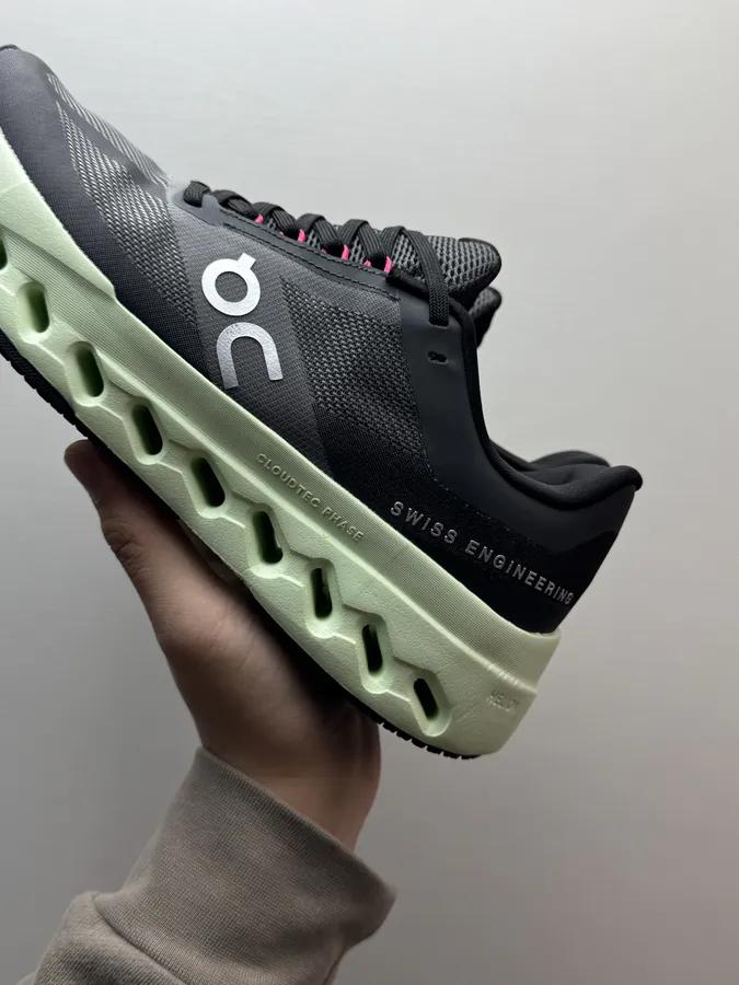 On Cloudsurfer Next in Black and Green