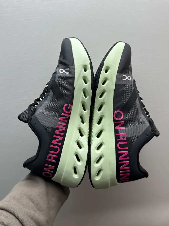 On Cloudsurfer Next in Black and Green