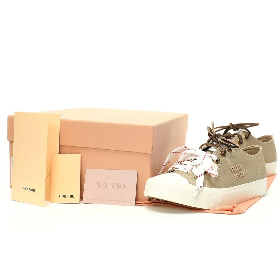 Miu Miu Washed Denim Low Sneakers with Frayed Edge