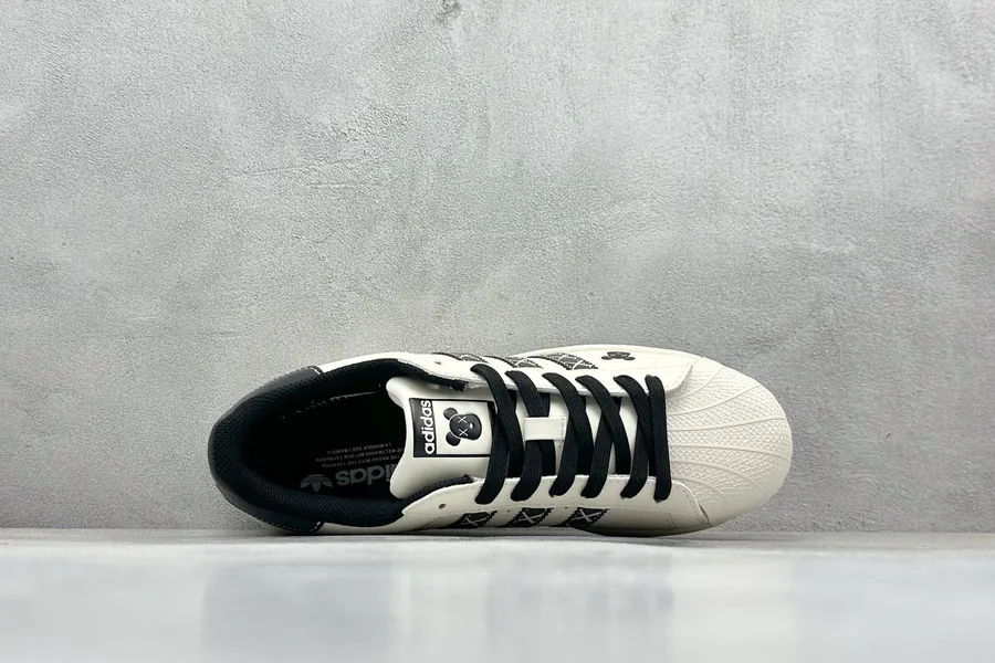 AD Originals Gazelle Indoor KAWS Collaboration Sneaker