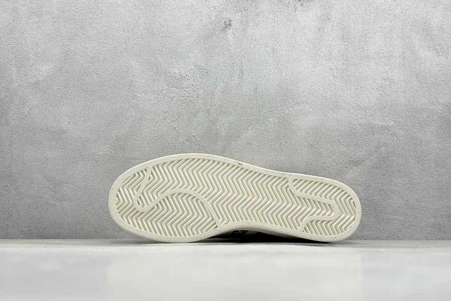 AD Originals Gazelle Indoor KAWS Collaboration Sneaker