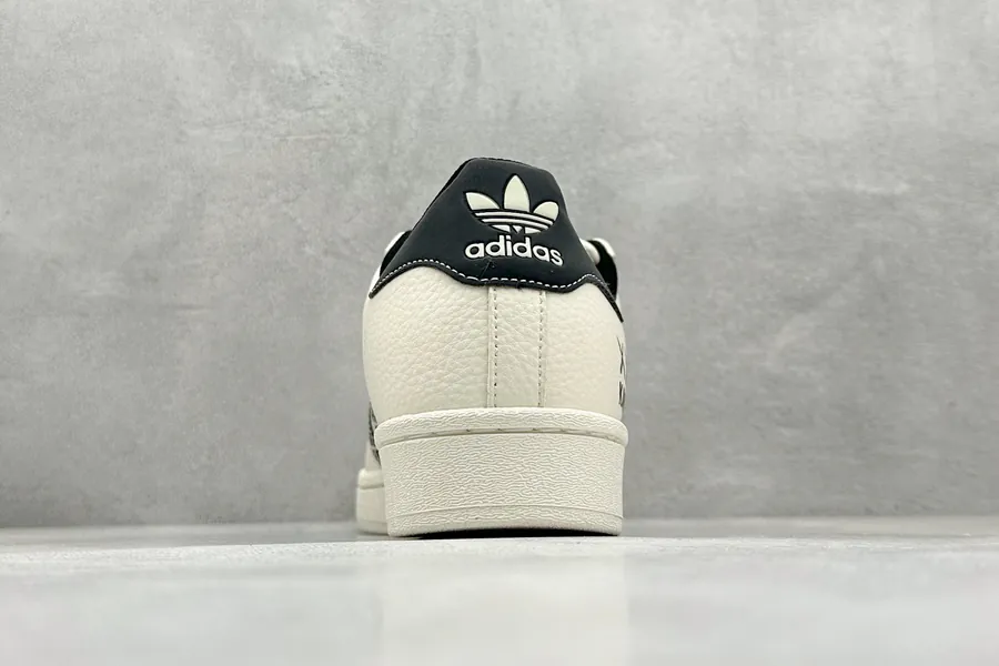 AD Originals Gazelle Indoor KAWS Collaboration Sneaker