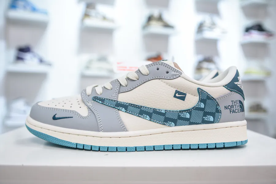 The North Face x Travis Scott Air 1 Low 1st Generation Low Sneaker White, Gray, and Blue Checkered Pattern