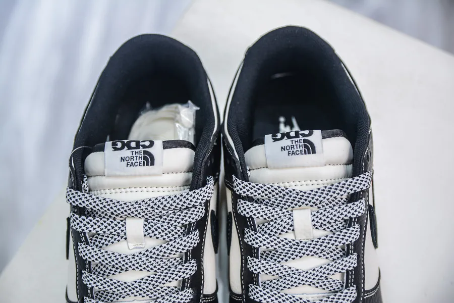 SB Dunk Low x The North Face Black and White Triple Stripe