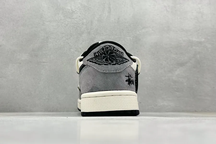Travis Scott x Air 1 Low Reverse Black and White Croc Strap Sneaker