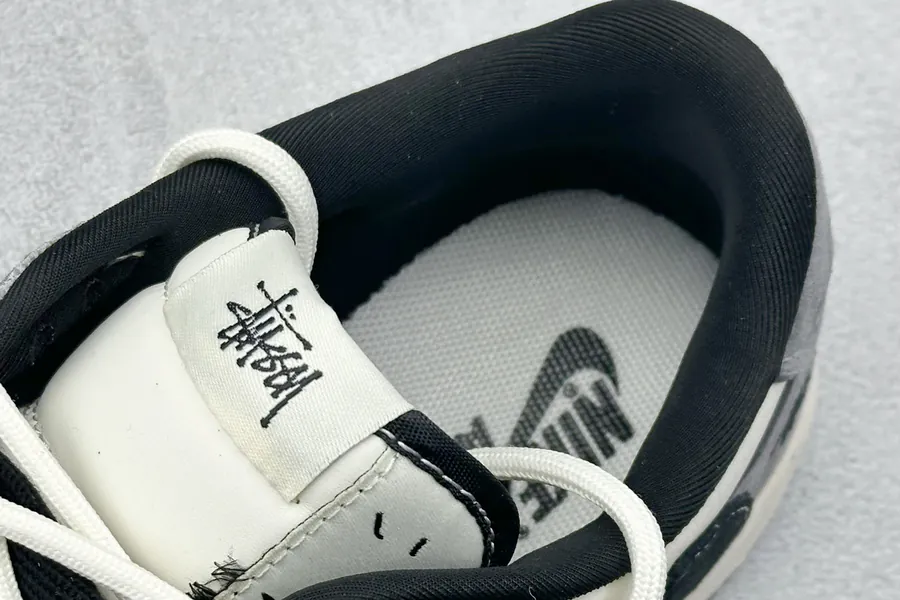 Travis Scott x Air 1 Low Reverse Black and White Croc Strap Sneaker