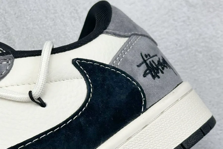 Travis Scott x Air 1 Low Reverse Black and White Croc Strap Sneaker