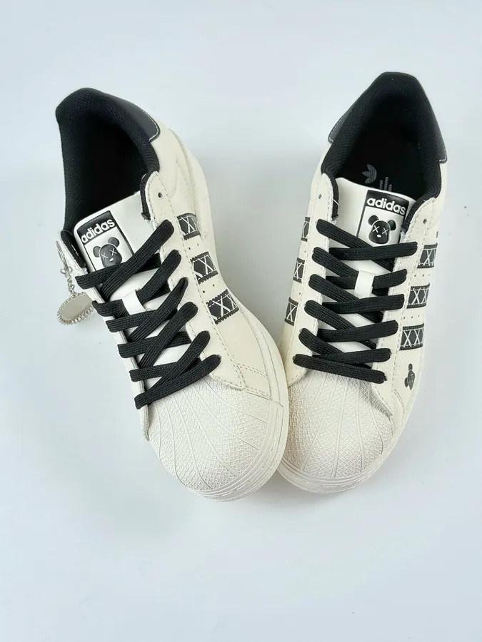 AD Originals Superstar x KAWS White Black
