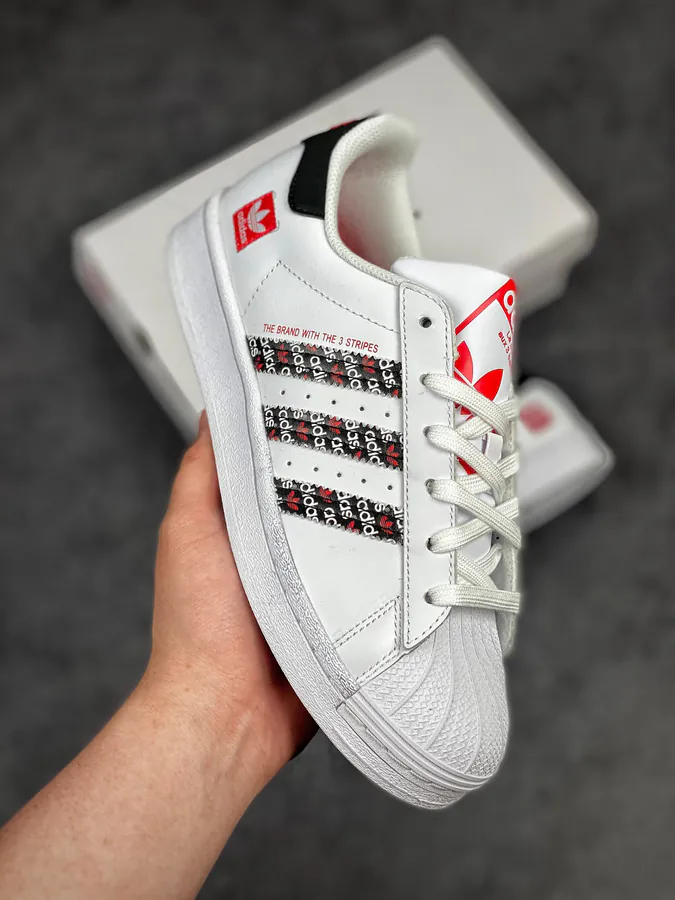 Originals Superstar Shell Toe Sneaker in WhiteBlackRed