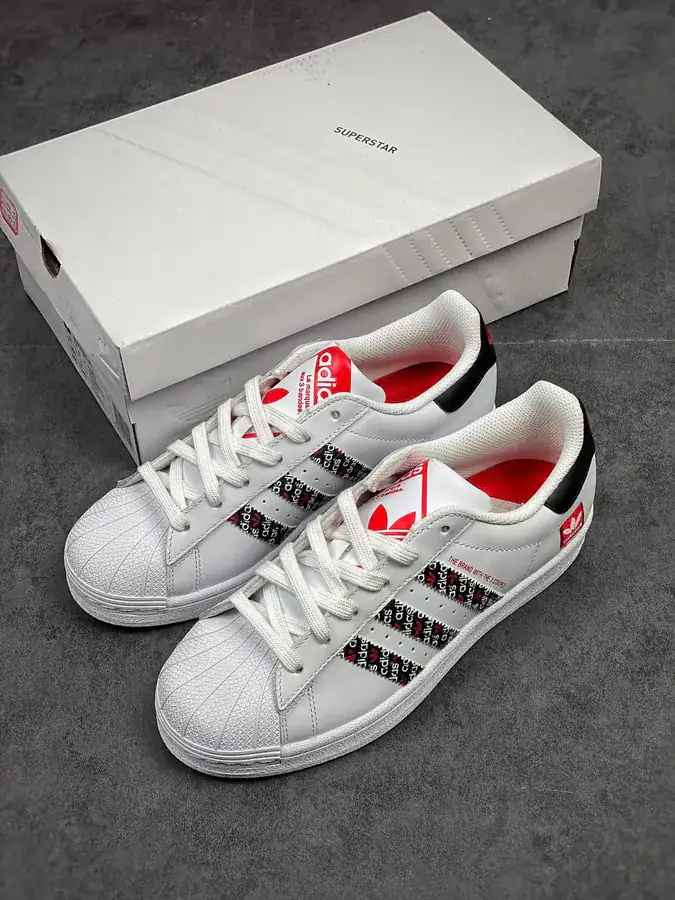 Originals Superstar Shell Toe Sneaker in WhiteBlackRed