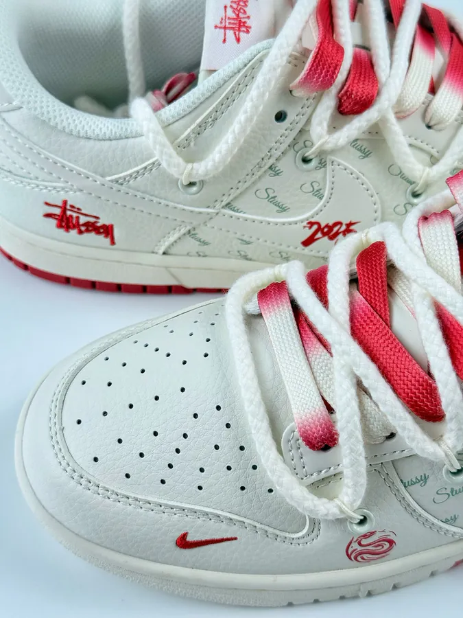 Nike SB Dunk Low x Stussy White Red Swoosh Strap