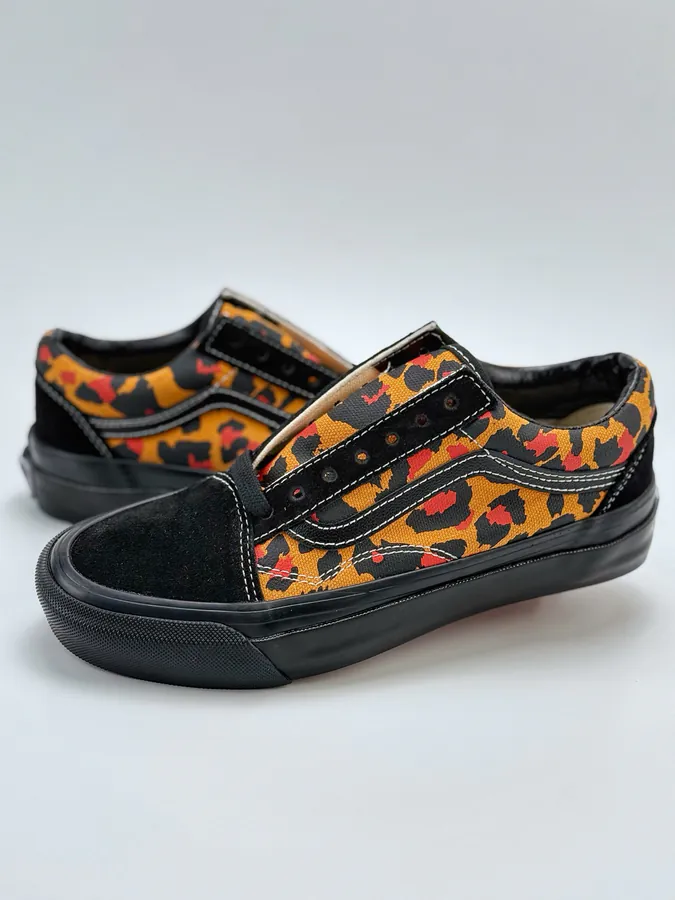 Men's and Women's LX Old Skool Canvas Sneakers with Black and Orange Leopard Print