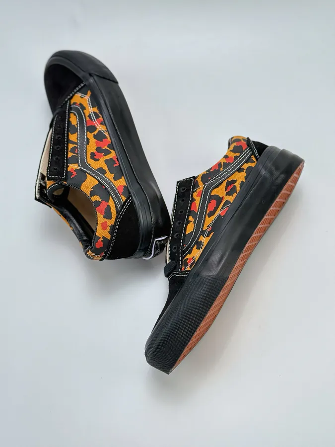 Men's and Women's LX Old Skool Canvas Sneakers with Black and Orange Leopard Print