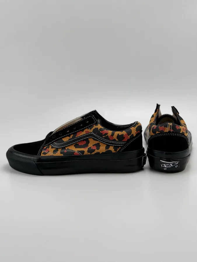 Men's and Women's LX Old Skool Canvas Sneakers with Black and Orange Leopard Print