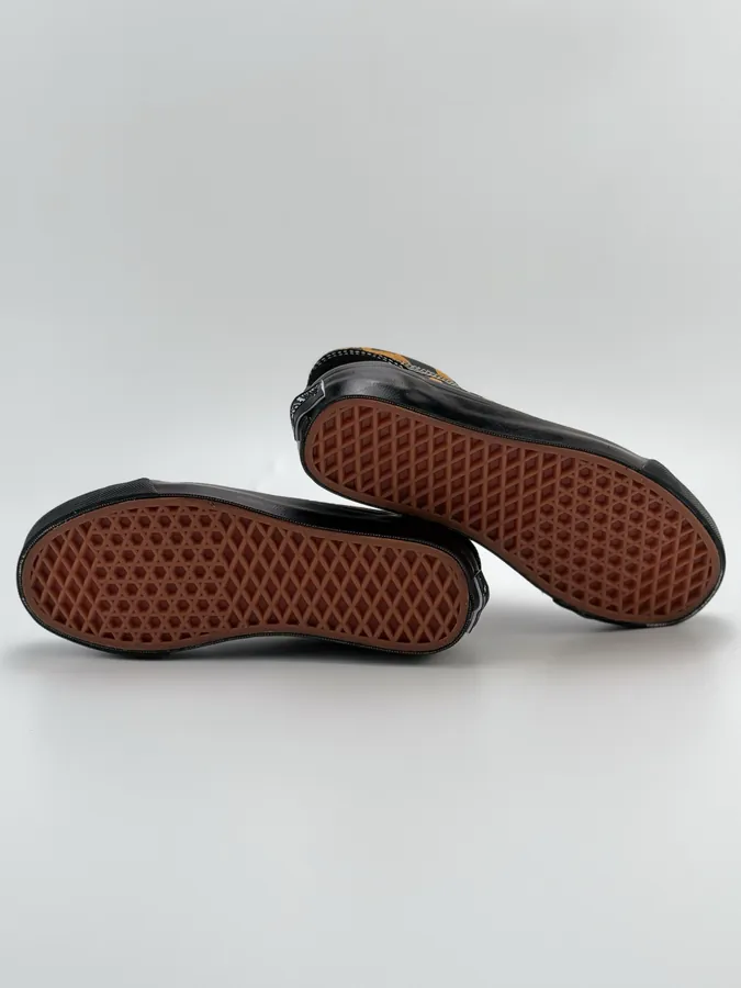 Men's and Women's LX Old Skool Canvas Sneakers with Black and Orange Leopard Print