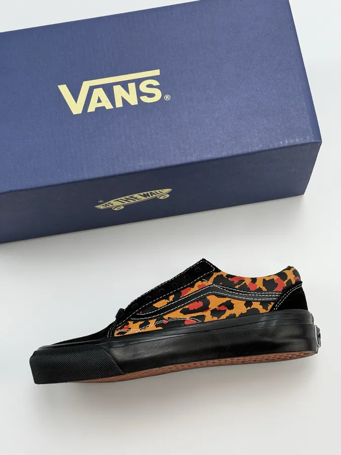 Men's and Women's LX Old Skool Canvas Sneakers with Black and Orange Leopard Print