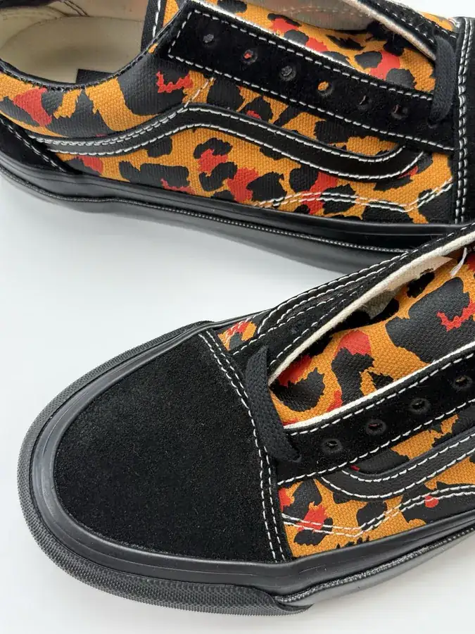 Men's and Women's LX Old Skool Canvas Sneakers with Black and Orange Leopard Print