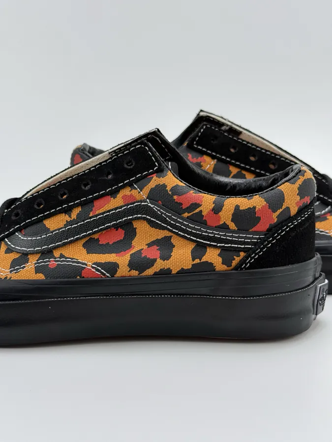 Men's and Women's LX Old Skool Canvas Sneakers with Black and Orange Leopard Print
