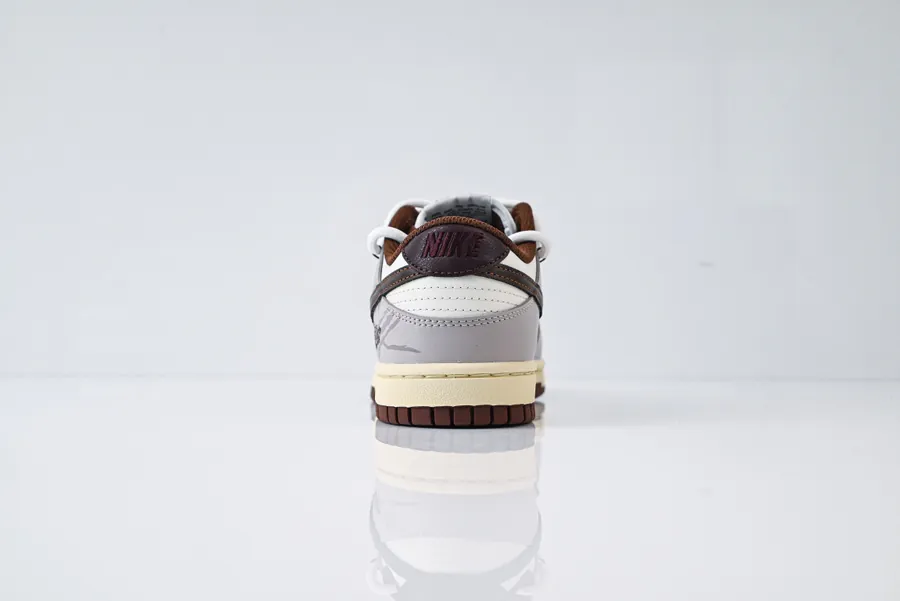 Nike Dunk Low in Brown with Cracked Grid Pattern