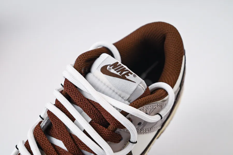 Nike Dunk Low in Brown with Cracked Grid Pattern