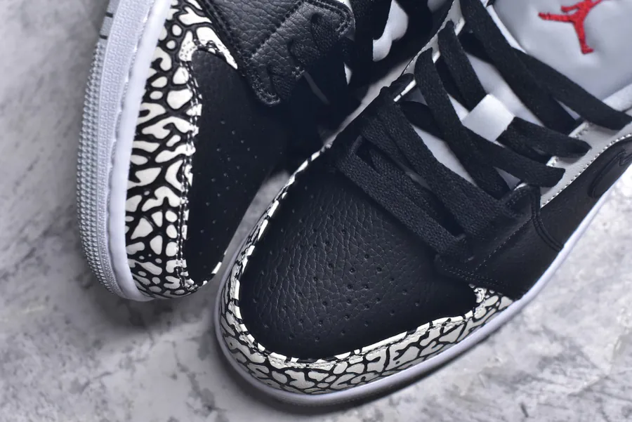 Air Jordan 1 Low in Black Cement