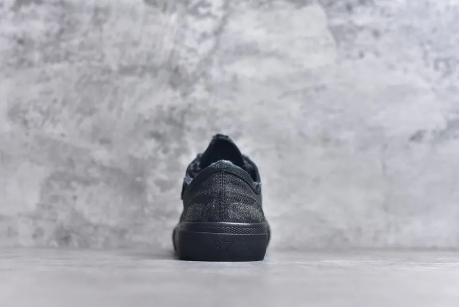 BALENCIAGA Black Low Top Canvas Sneakers with Brand Logo