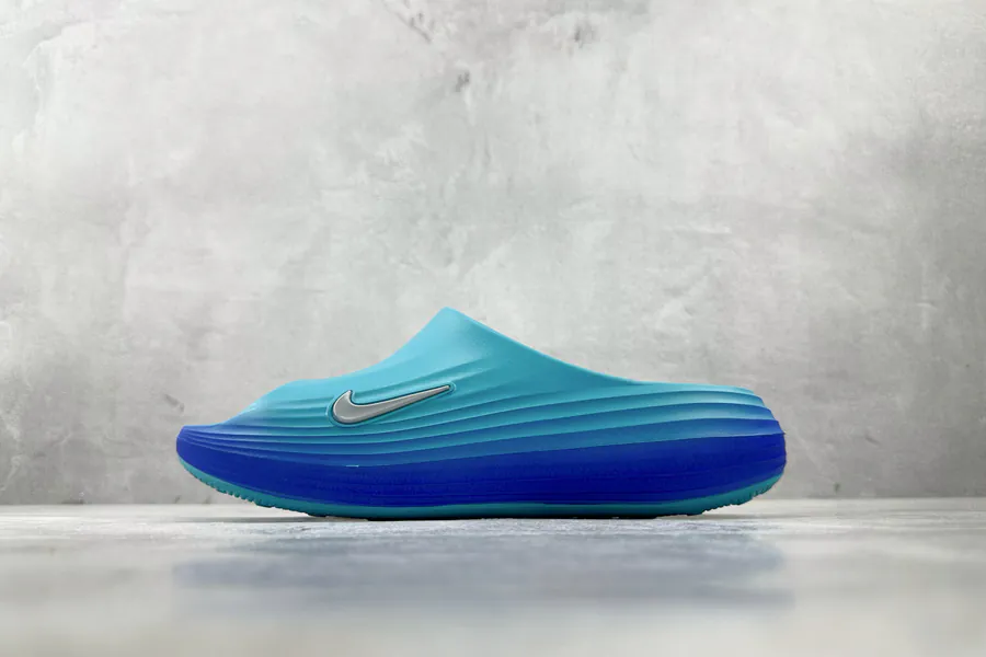 Nike ReactX Rejuven8 Slide in Green Blue