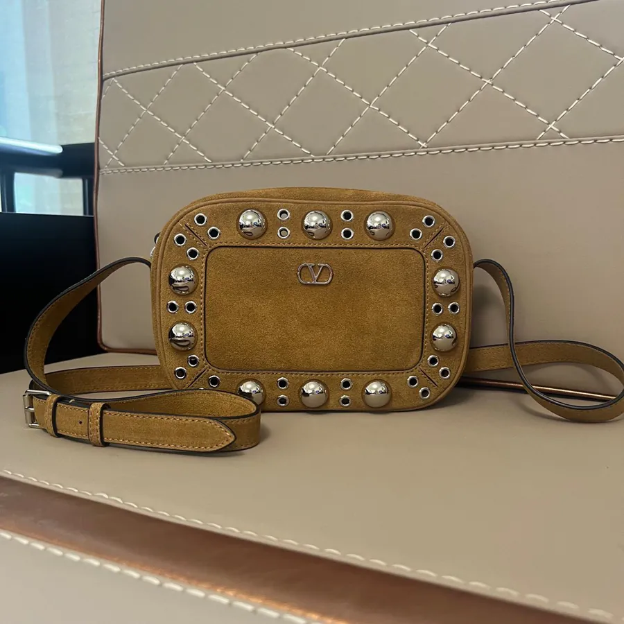 GARAVANI NELLCÔTE Chain Handbag with Round Holes and Metal Logo