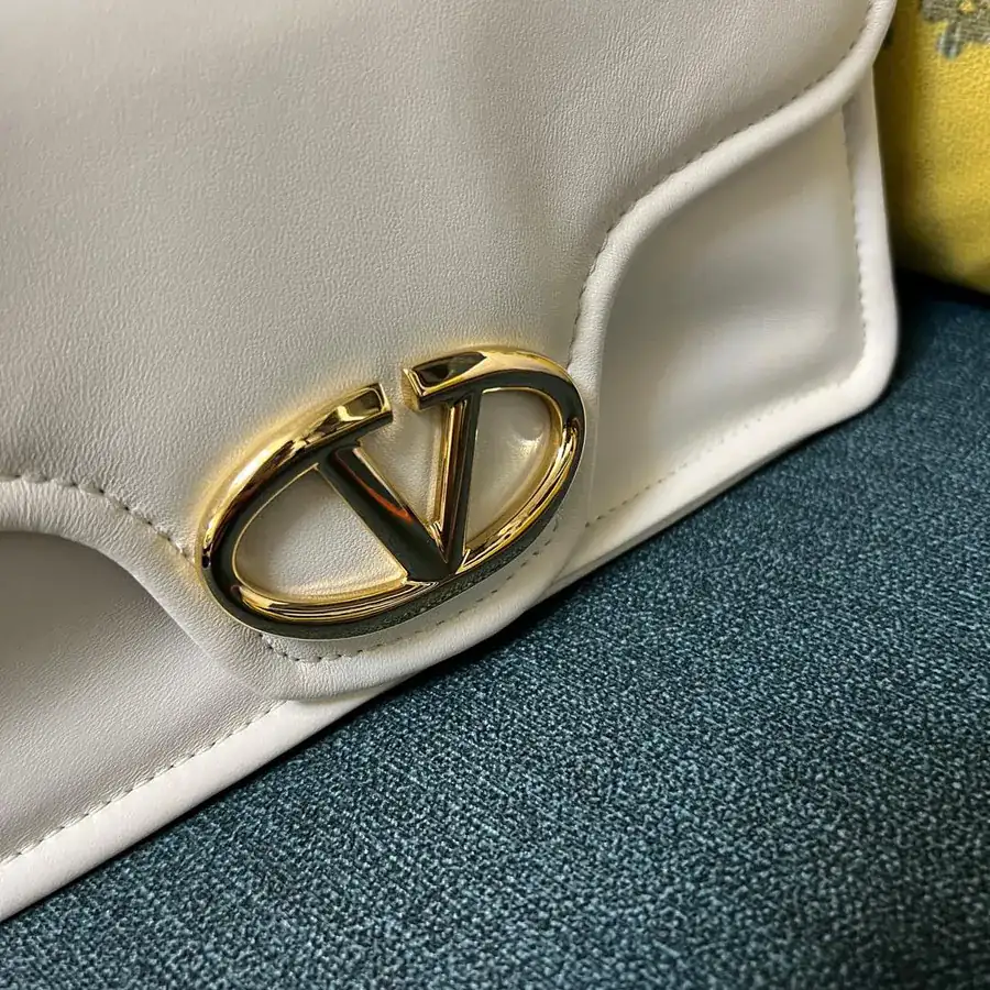 VLOGO 1960 Medium Leather Bag with Detachable Handles and Signature Metal Elements