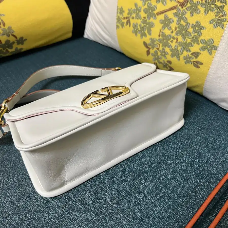 VLOGO 1960 Medium Leather Bag with Detachable Handles and Signature Metal Elements