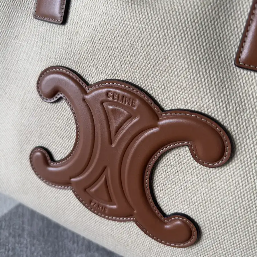 CE New Drawstring Large Shopping Bag with Soft Leather and Embossed Triumph Logo